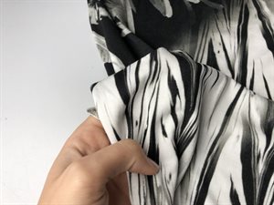 Viscosejersey - store flotte fjer i grå toner